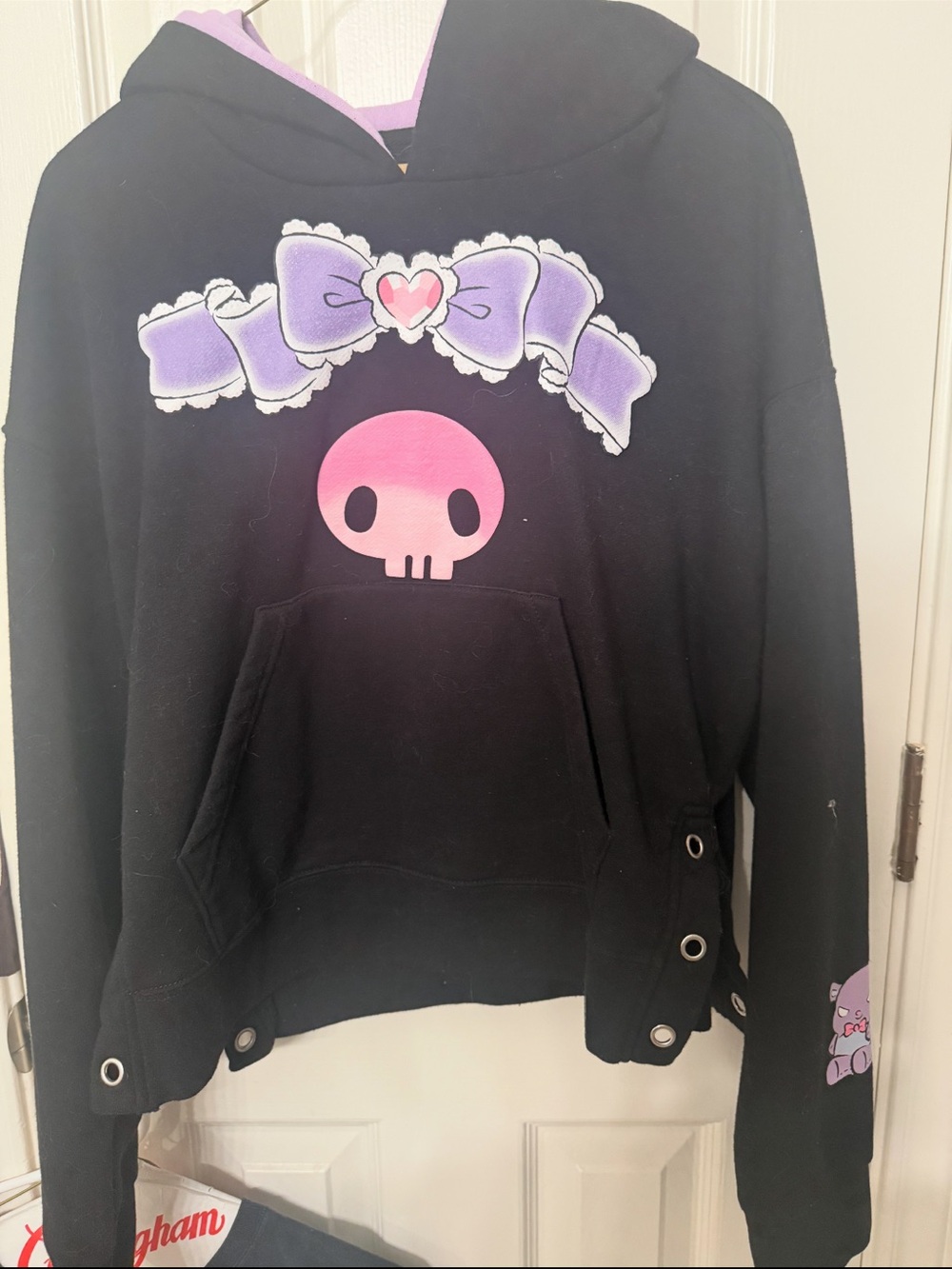 Sanrio Black Hoodie with Pink Skull and Purple Bow Graphic